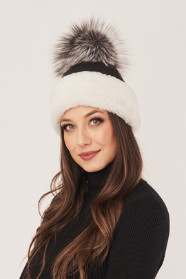 Women's black sheepskin hat with fox pompom